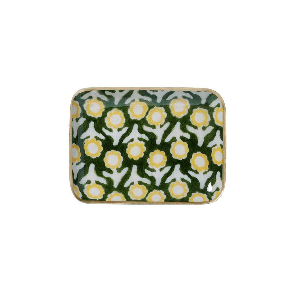 Rectangular ceramic tray with floral pattern on a green background