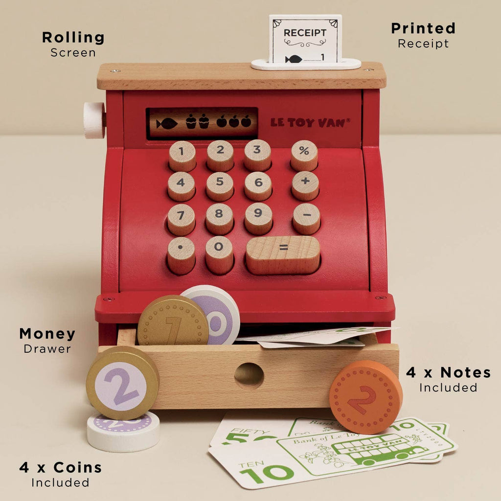 Toy cash register with wooden and red components on a beige background