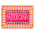 Cambridge Imprent - Paperchain box featuring a vibrant orange and pink patterned design with a central pink label that reads 'PAPERCHAIN' - winter's moon