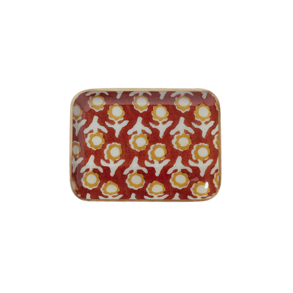 Rectangular ceramic tray with floral pattern on a green background