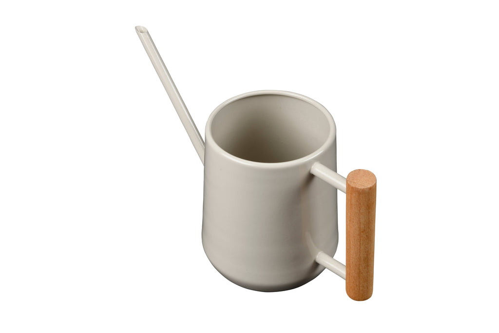 Gray mug with a wooden handle and straw on a white background