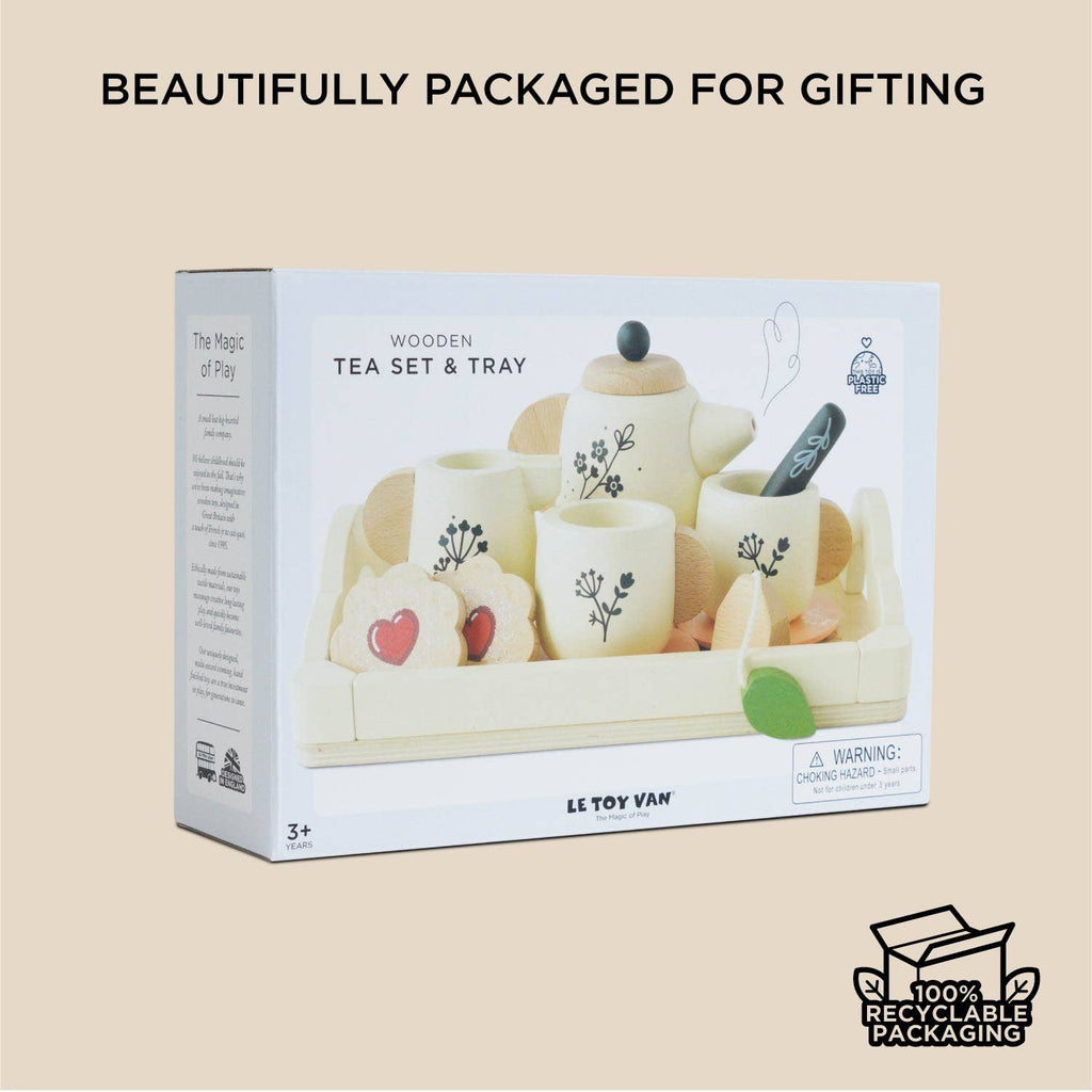 Le Toy Van wooden tea set & tray packaging on a beige background