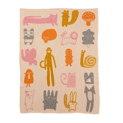 Organic cotton baby blanket with colorful animal illustrations on a white background