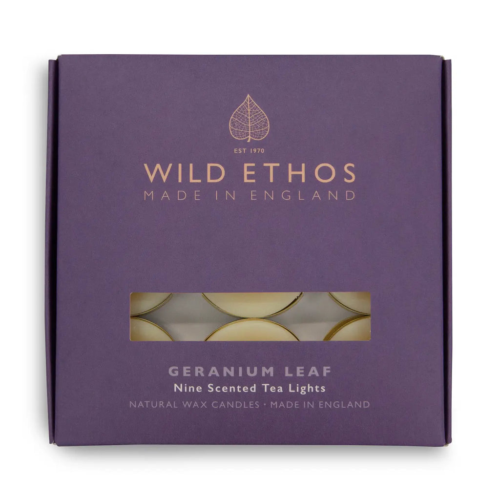 Purple packaging of Wild Ethos Geranium Leaf tea lights on a white background