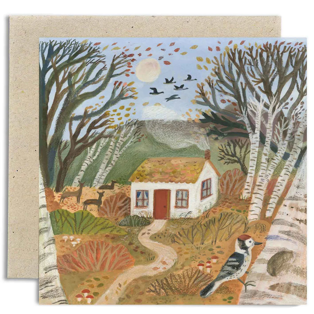 Greeting card with a colorful illustration of a house in nature, trees, and birds.