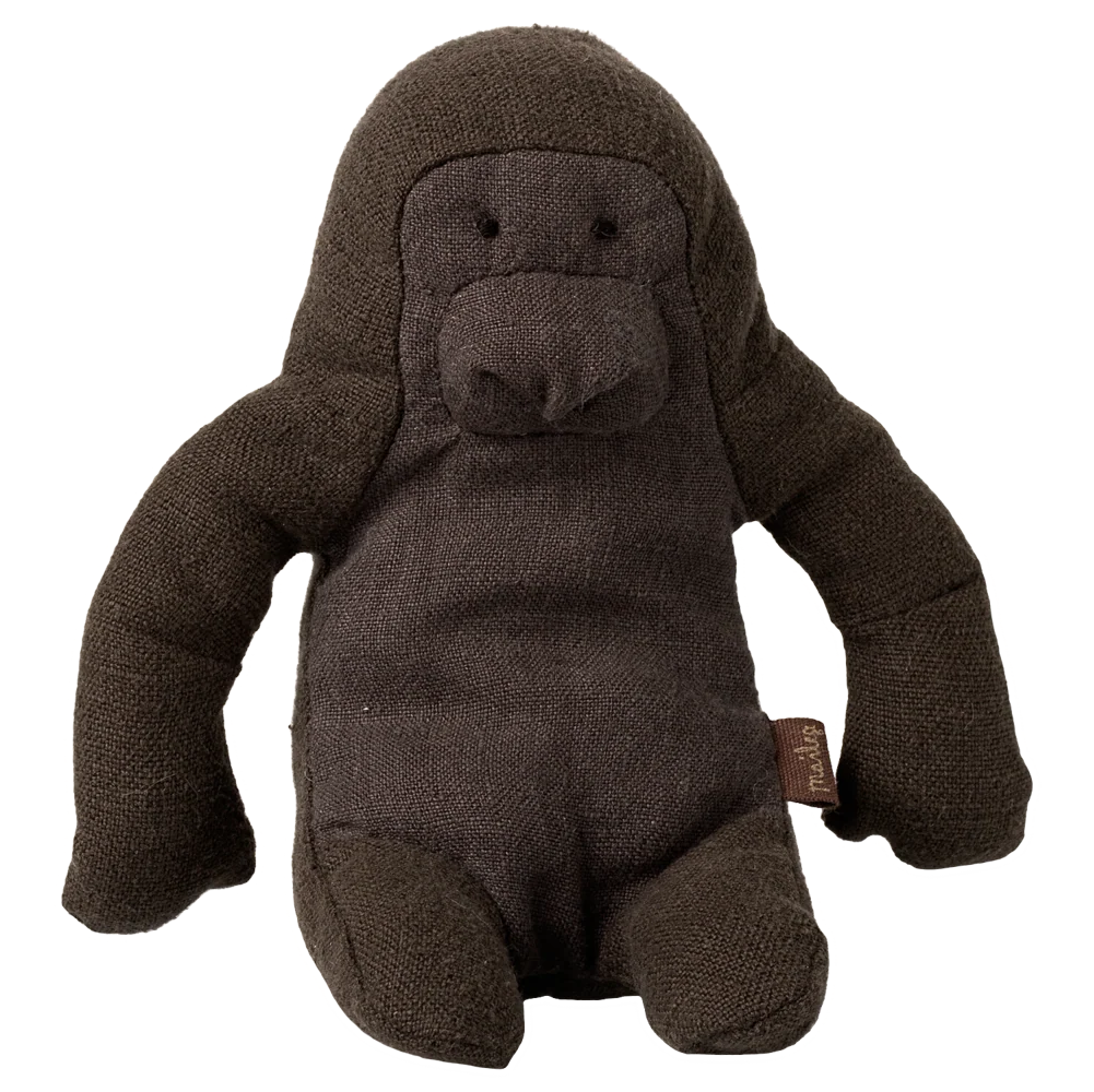 A dark brown plush gorilla toy made of textured fabric, shown against a plain white background.