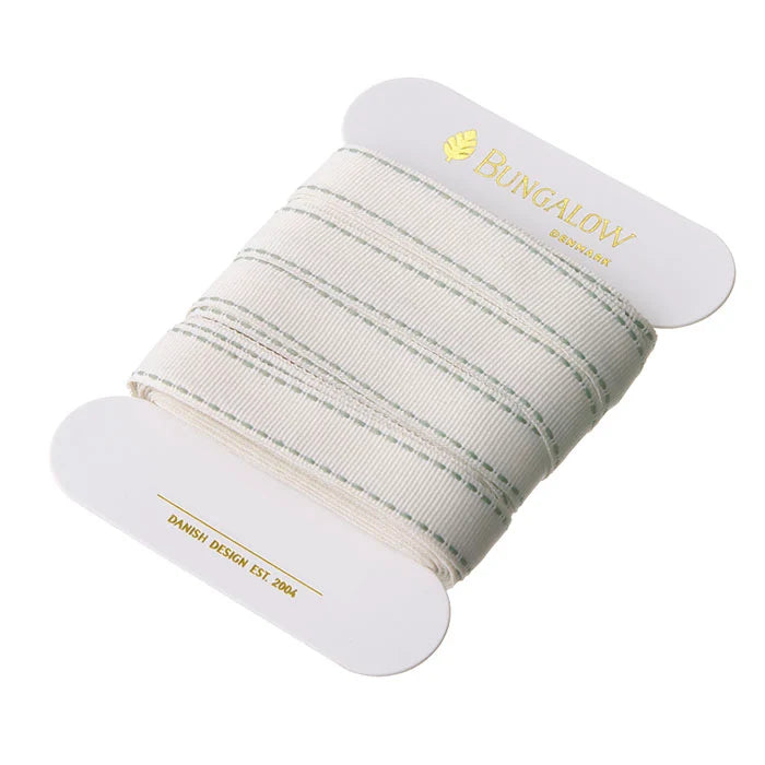 bungalow denmark - roll of off white ribbon with ivy green stitched edges - winter's moon