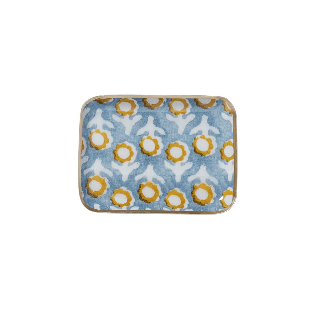 Rectangular fabric sample with a floral pattern on a blue background