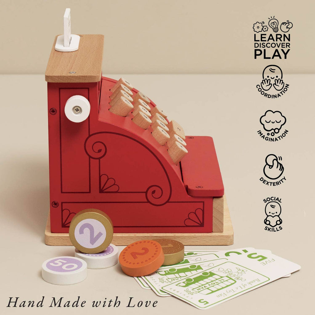 Red toy cash register with wooden components on a beige background, featuring 'Learn Discover Play' icons.