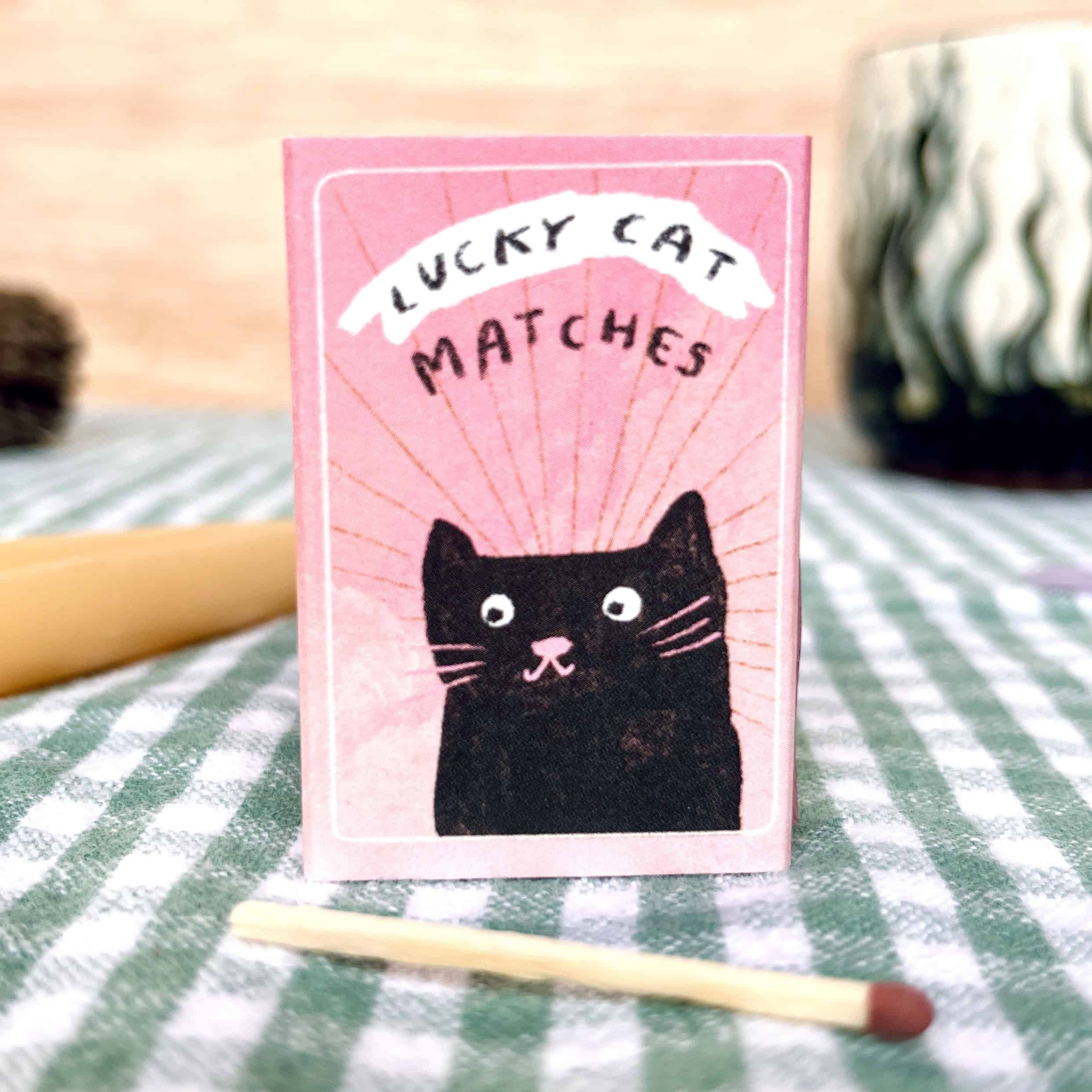 laura skillbeck - mini box of matches with a 'lucky cat' illustration on gingham cloth - winter's moon