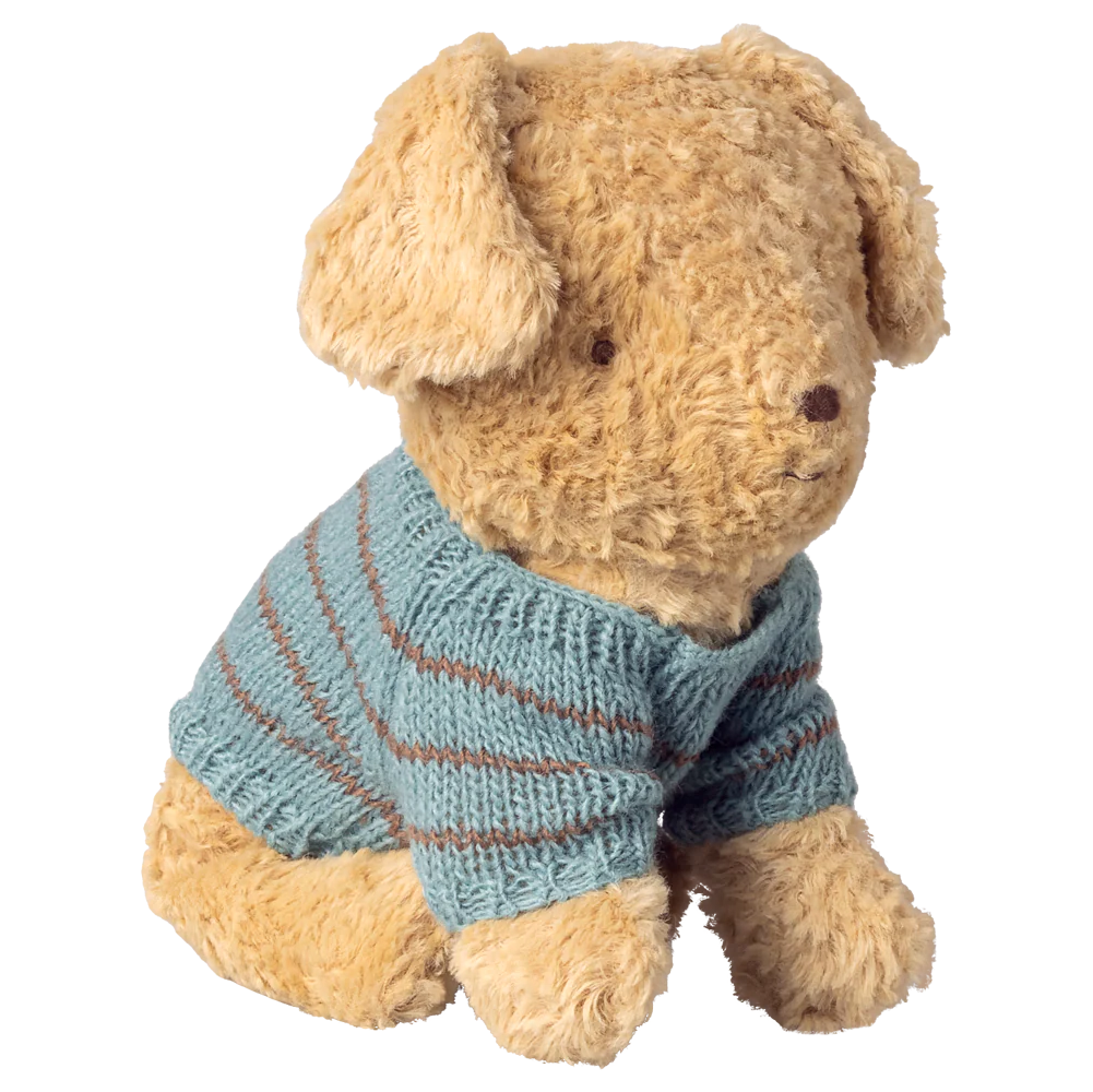 maileg - small soft sand puppy wearing a blue and brown striped knitted sweater on white background - winter's moon