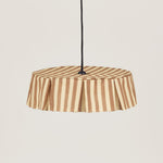 Striped pendant lampshade on a beige background