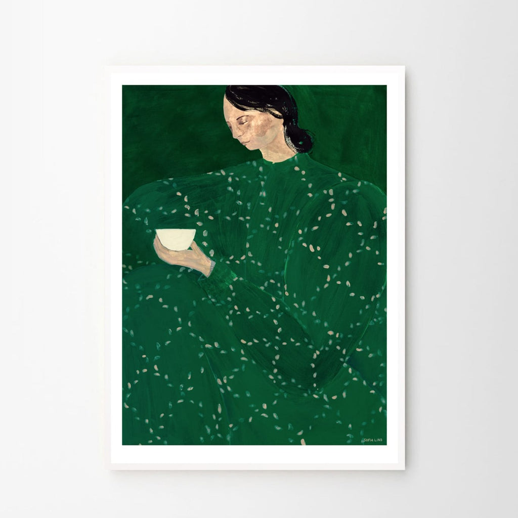 Woman in green dress holding a cup Art print by Sofia Lind